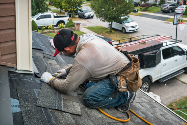 Professional Roofing technician working in Hingham, WI